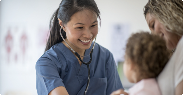 Nurse practitioner providing care to child