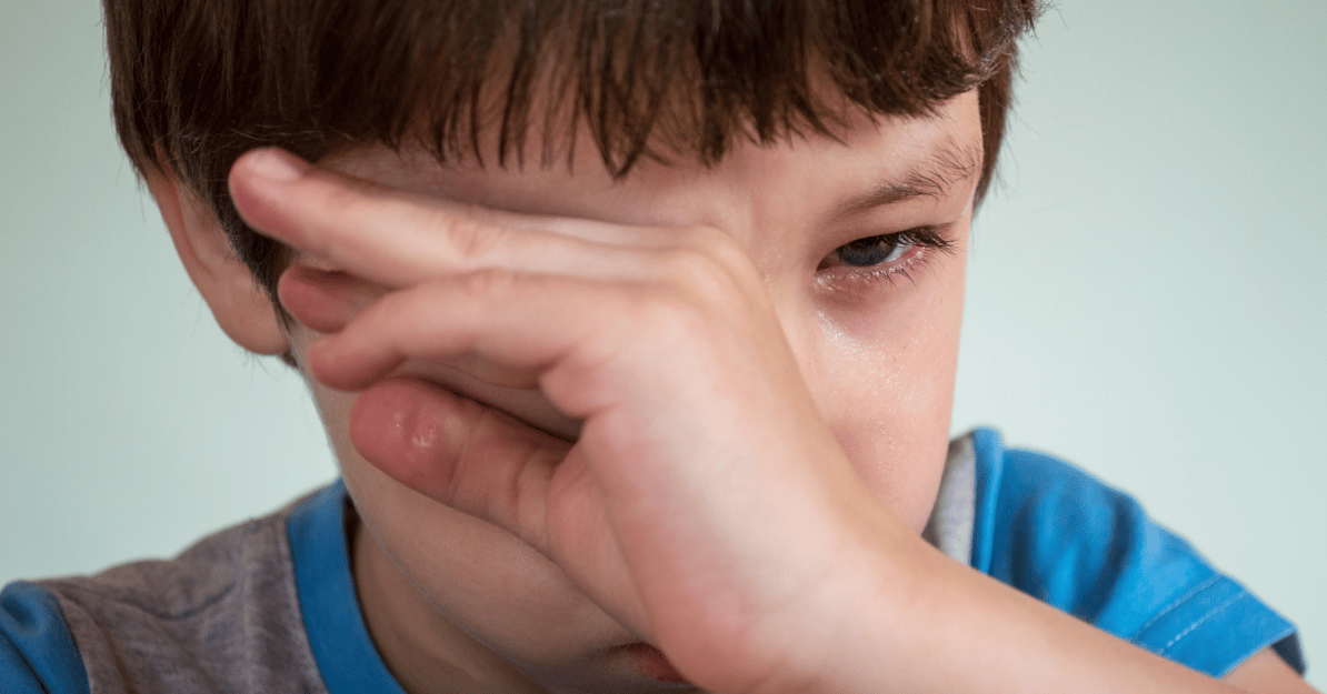 child with hurt eye